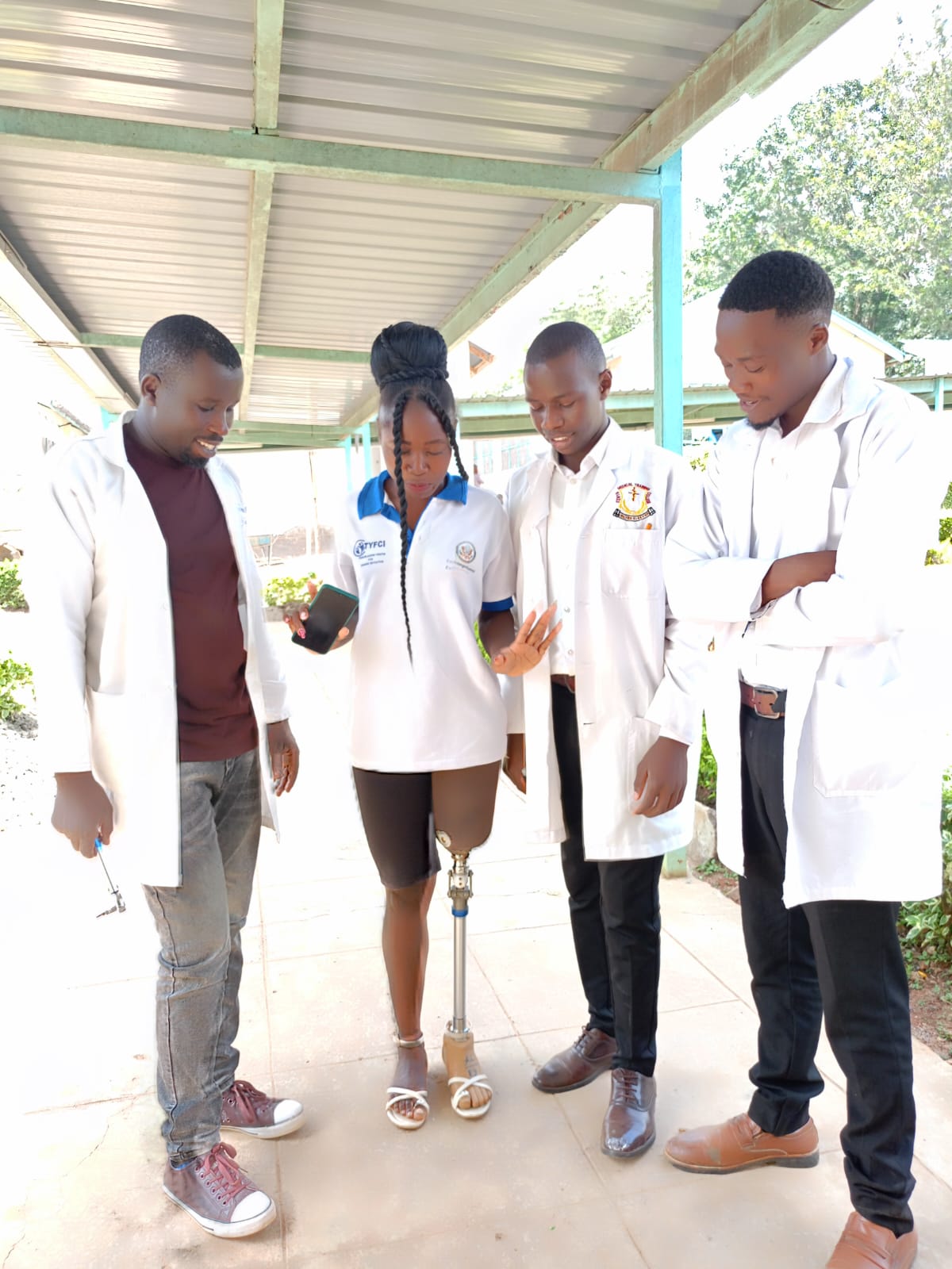 Charity in her new avbove-knee prosthesis